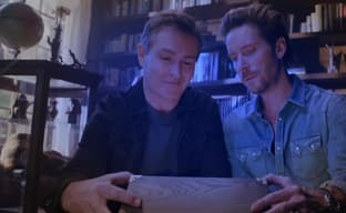 Troy Baker whips Nolan North in the release date trailer for the PS5 version of Indiana Jones and the Great Circle