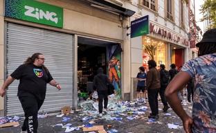 Video game store employee stood in the way of looters in France. The video went viral