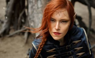 Cosplayer transformed into a representative of the Altmer race from The Elder Scrolls 5: Skyrim