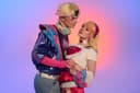 Cosplayers transformed into Lux and Ezreal from League of Legends: Wild Rift - a couple in love