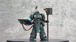 A los fans de los Hijos de Horus les mostraron el unboxing de la figura de Rompesitios de Asedio de Warhammer: The Horus Heresy de JoyToy