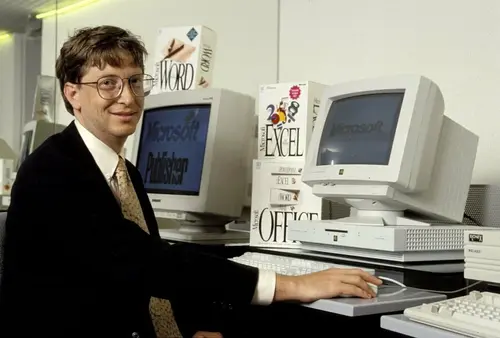 Bill Gates at a computer with Windows